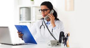 Medical practice receptionist on phone call