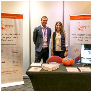 Thom and Amanda at Synapse booth attending the 15th National Rural Health Conference